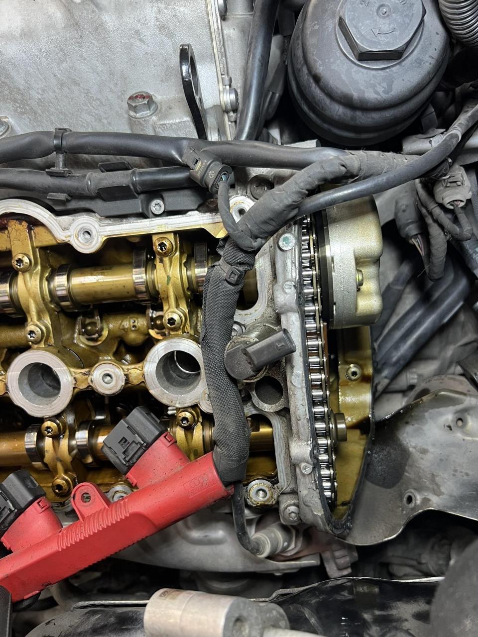 奥迪q7ea837发动机冷启动异响,更换改进正时装紧器