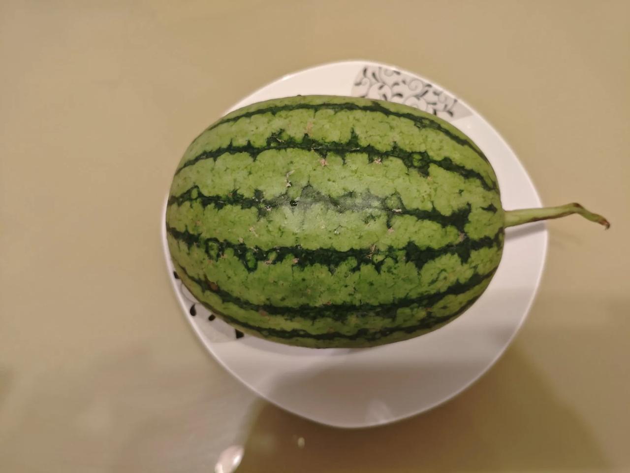 今年西安市场上卖的这种吊瓜西瓜,你吃过吗?