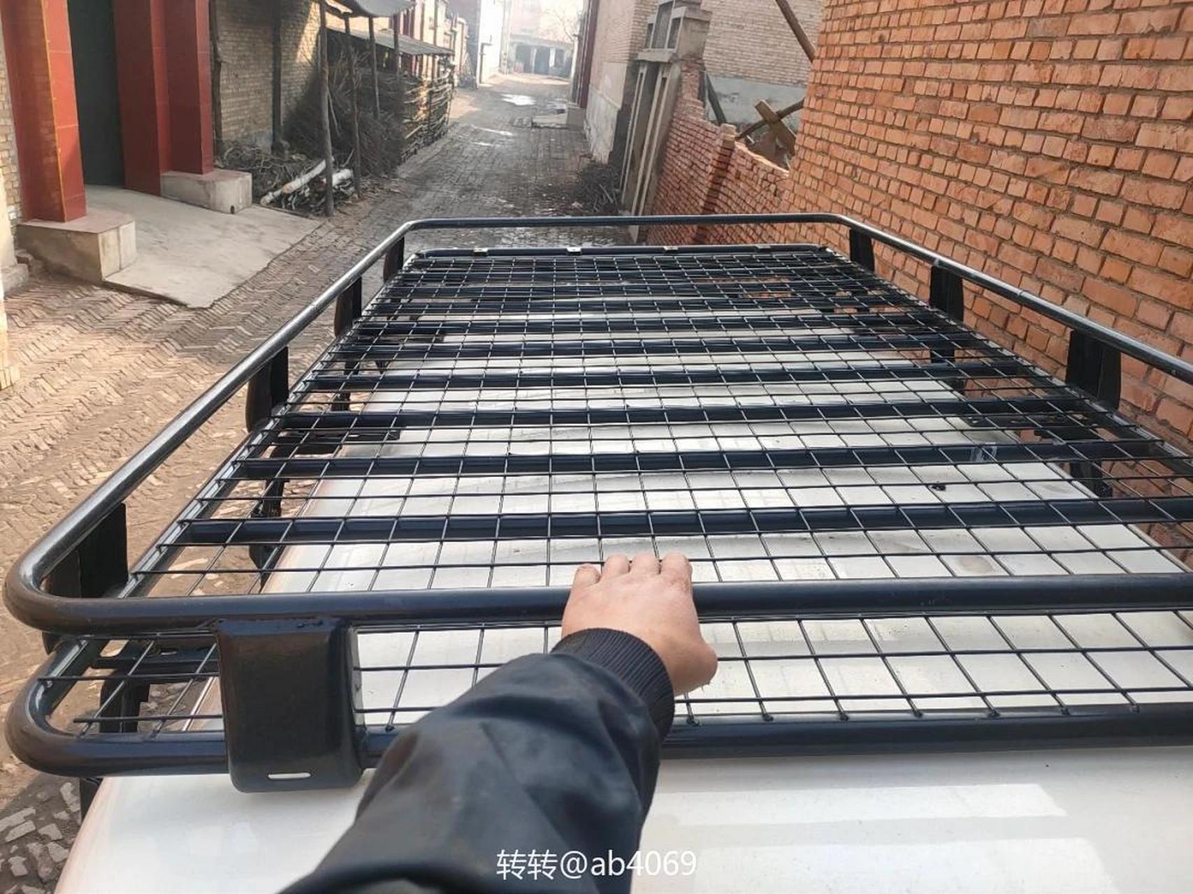 瞧瞧猎豹黑金刚改装行李架帕杰罗v31v32v33速腾奇兵猎豹q6行李架顶框