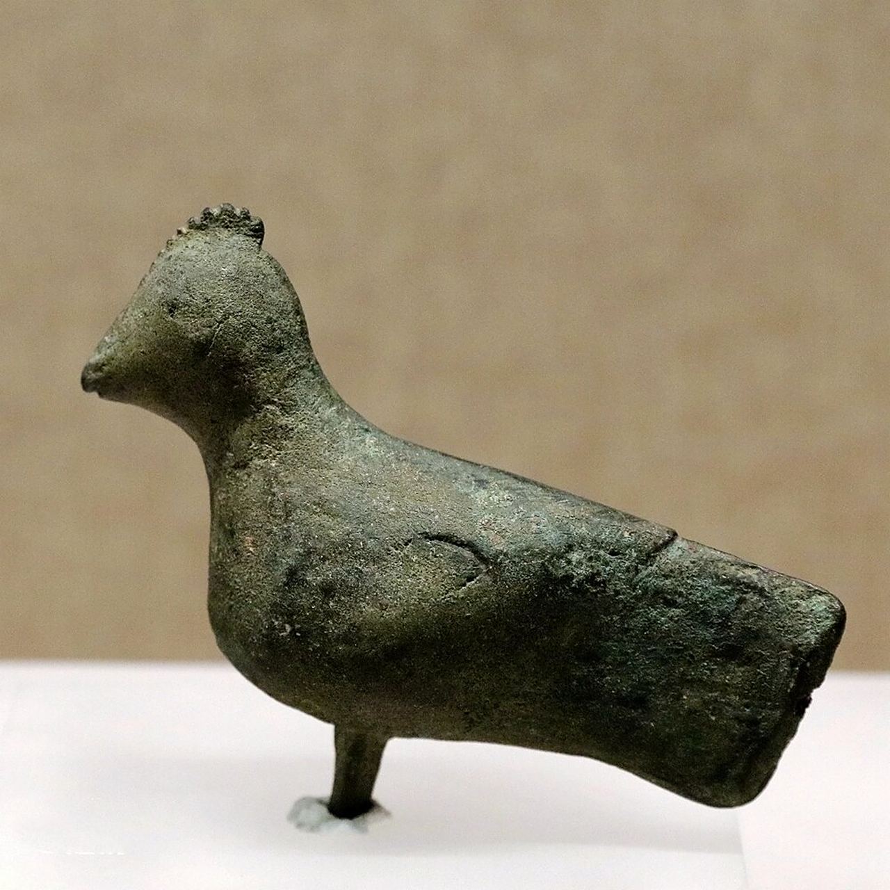 敦煌博物馆的文物 图1:北魏影塑佛像(莫高窟出土) 图2:魏晋铜鸠(中国