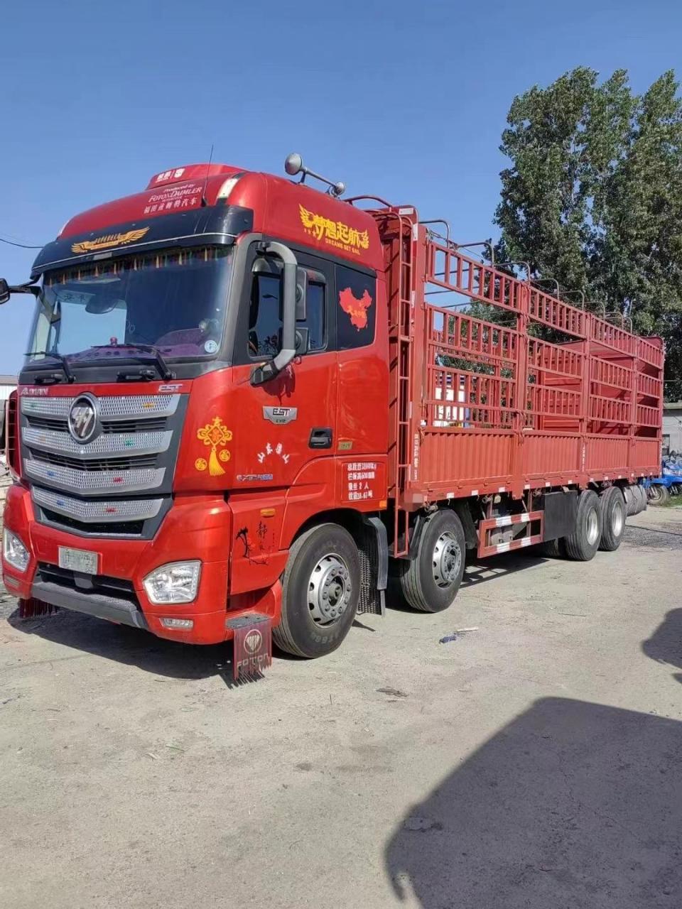 21年欧曼est前四后八9.6米高栏载货车!