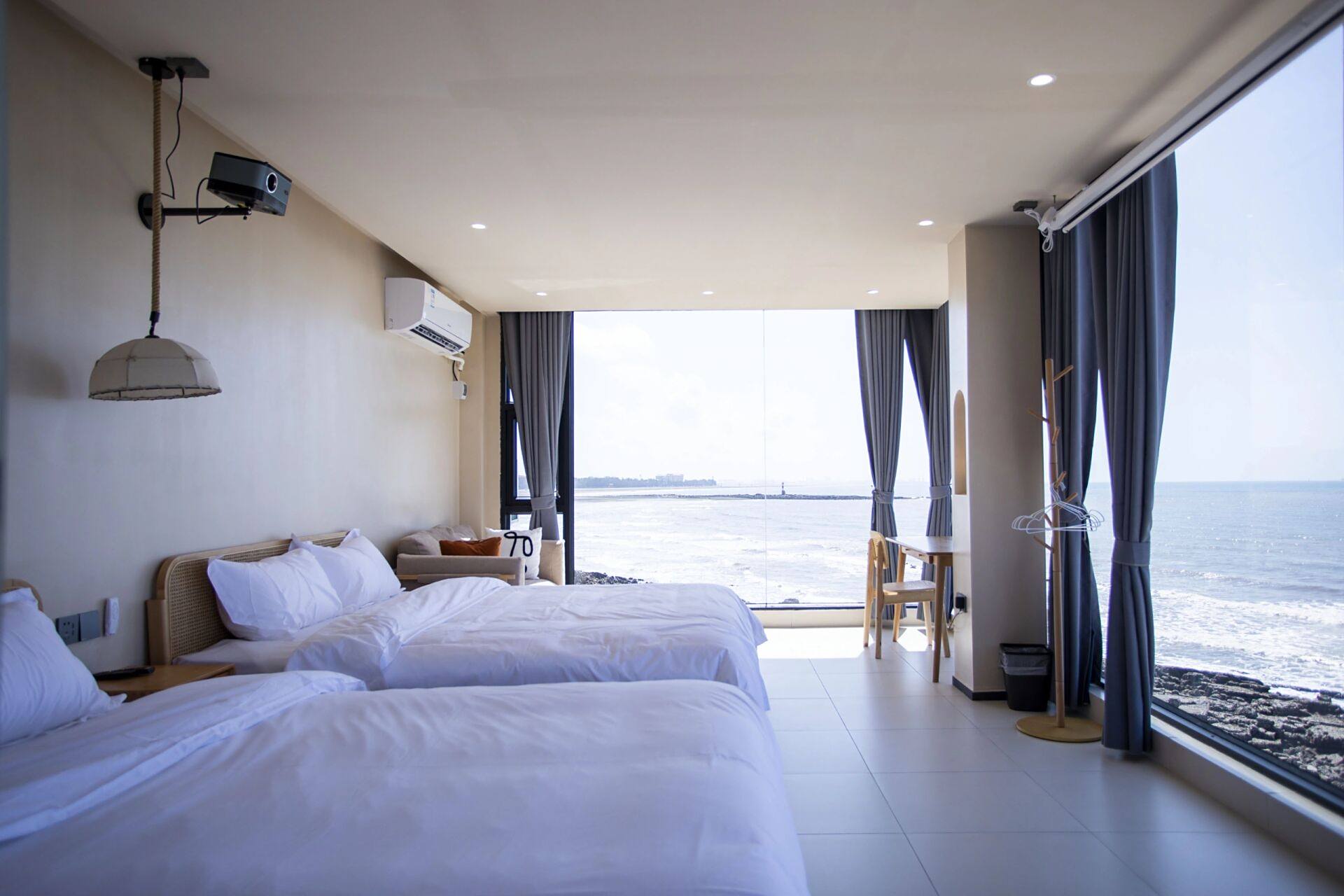 防城港阿塔曼海景民宿 位置:阿塔曼海景民宿位于防城港白浪滩景区旁边