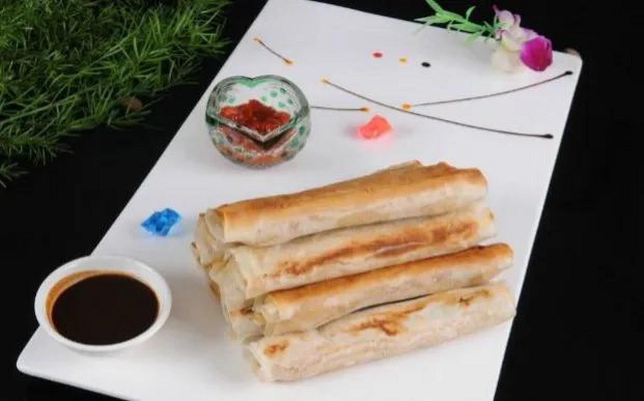 葱包烩是浙江省杭州市的一种传统名点,属于浙菜系.