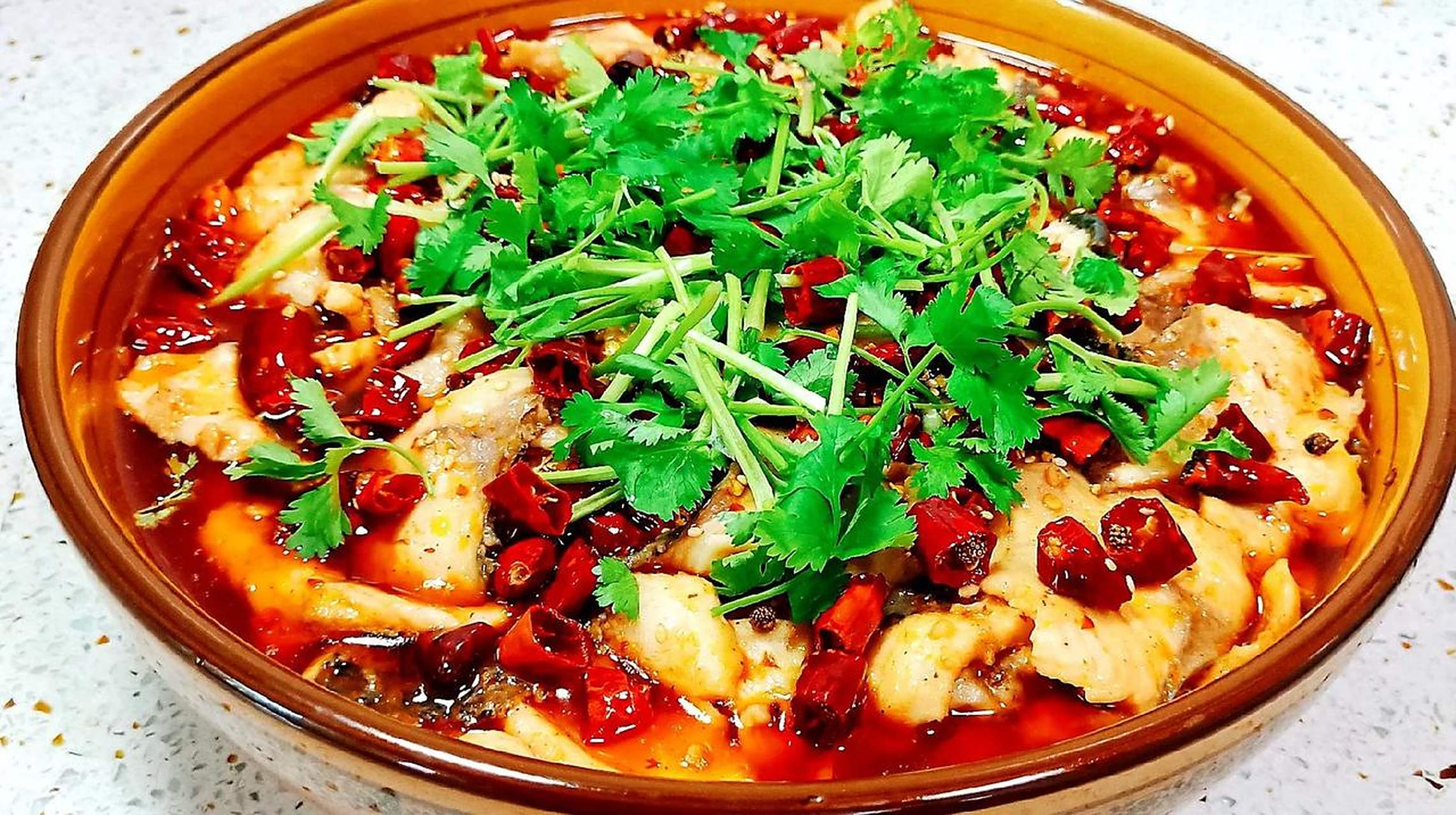 四川省美食之"水煮鱼" 水煮鱼:四川特色鱼类美食,采用加工技艺让鱼片