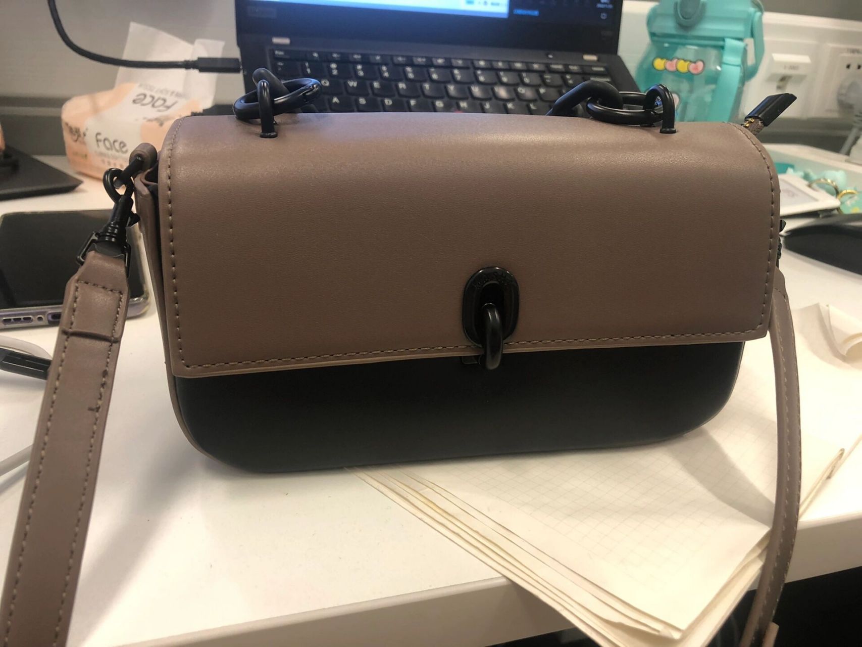 玛莎包包,在抖音一个包包博主直播间买的,质量很好91,就是和我预期