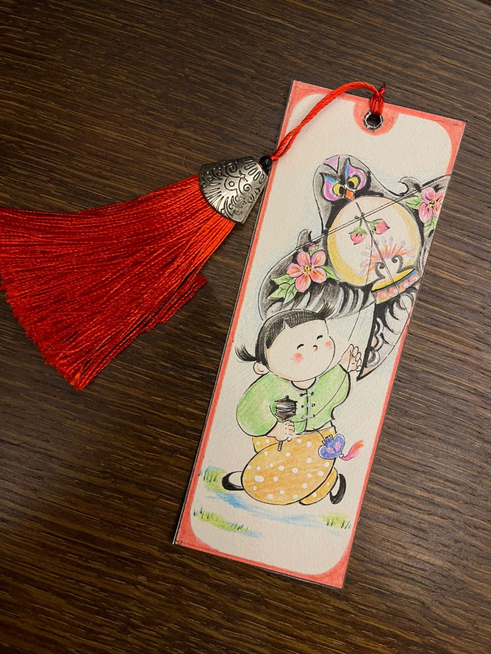 小学生书签制作 做了个书签,图片临摹一个水彩画,我用彩铅.