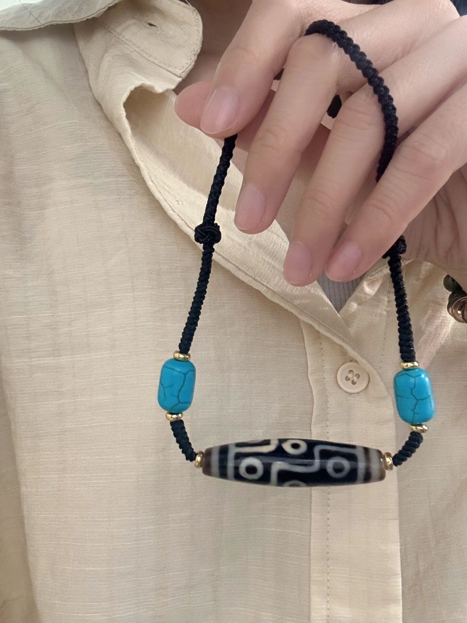 16615第一种说法:九眼天珠女人不能佩戴,是因为九眼天珠是一种