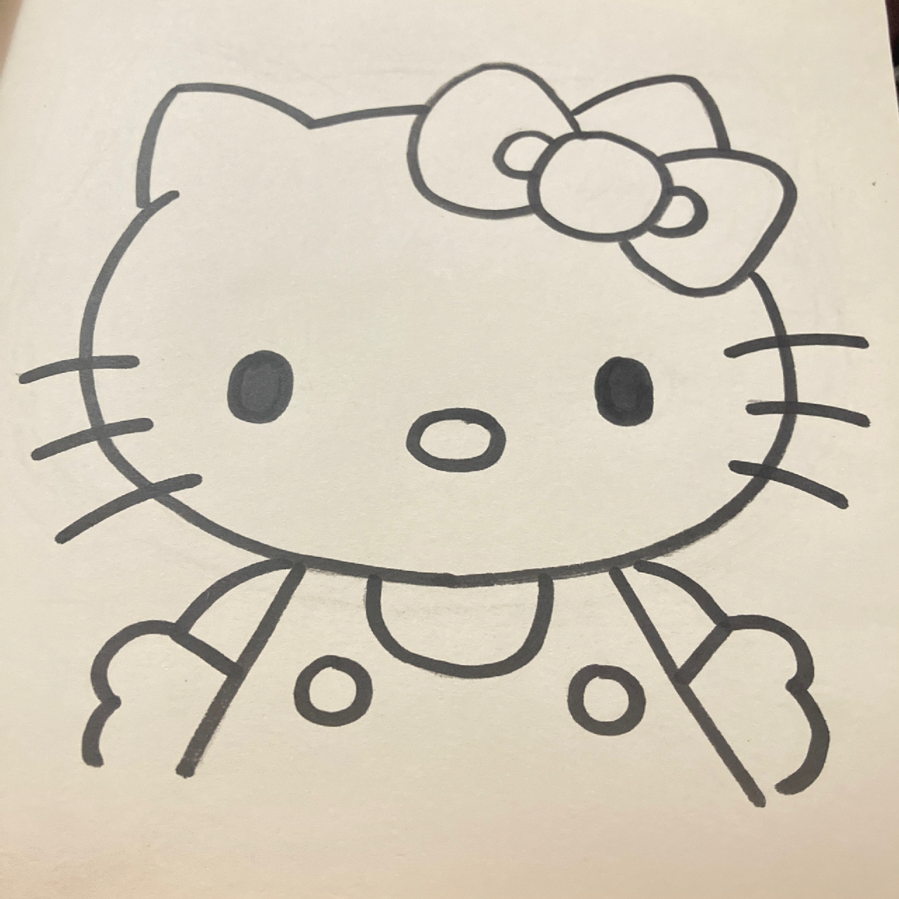 hello kitty油画棒简笔画        一定要先画白色猫猫脸再用黑色蜡笔