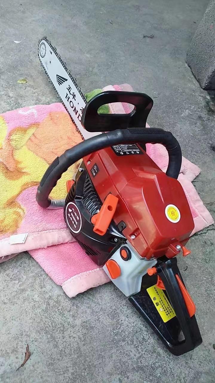 五羊本田四冲程大功率油锯汽油锯伐木锯进口链条小型家用砍树机