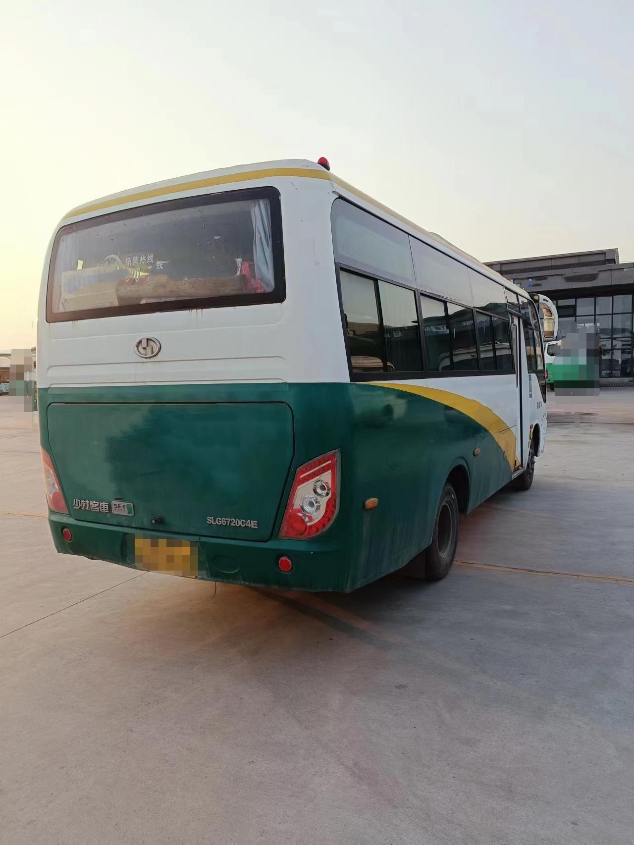 少林客车6720型号15年12月份29座玉柴130马力国4排放空调推拉窗