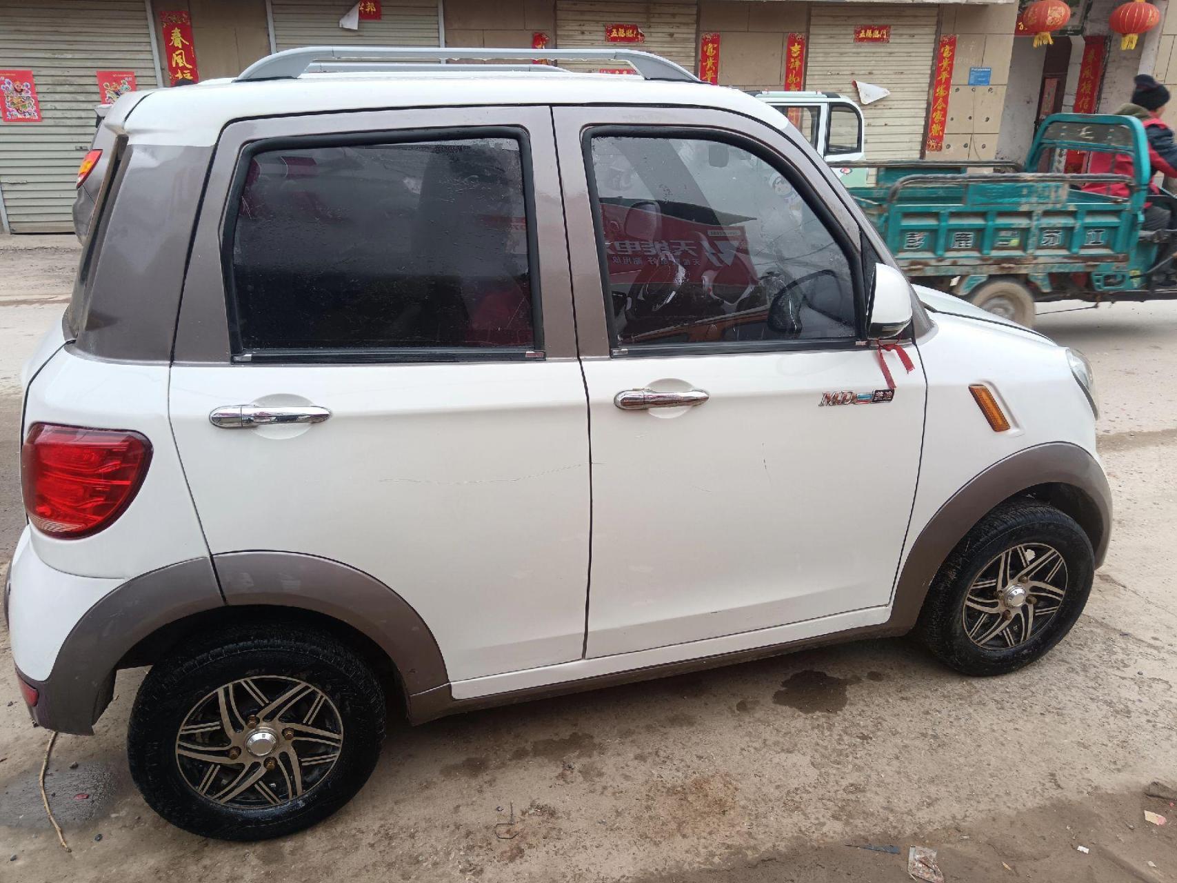 四轮低速电动车 新到高配美的电轿,9.