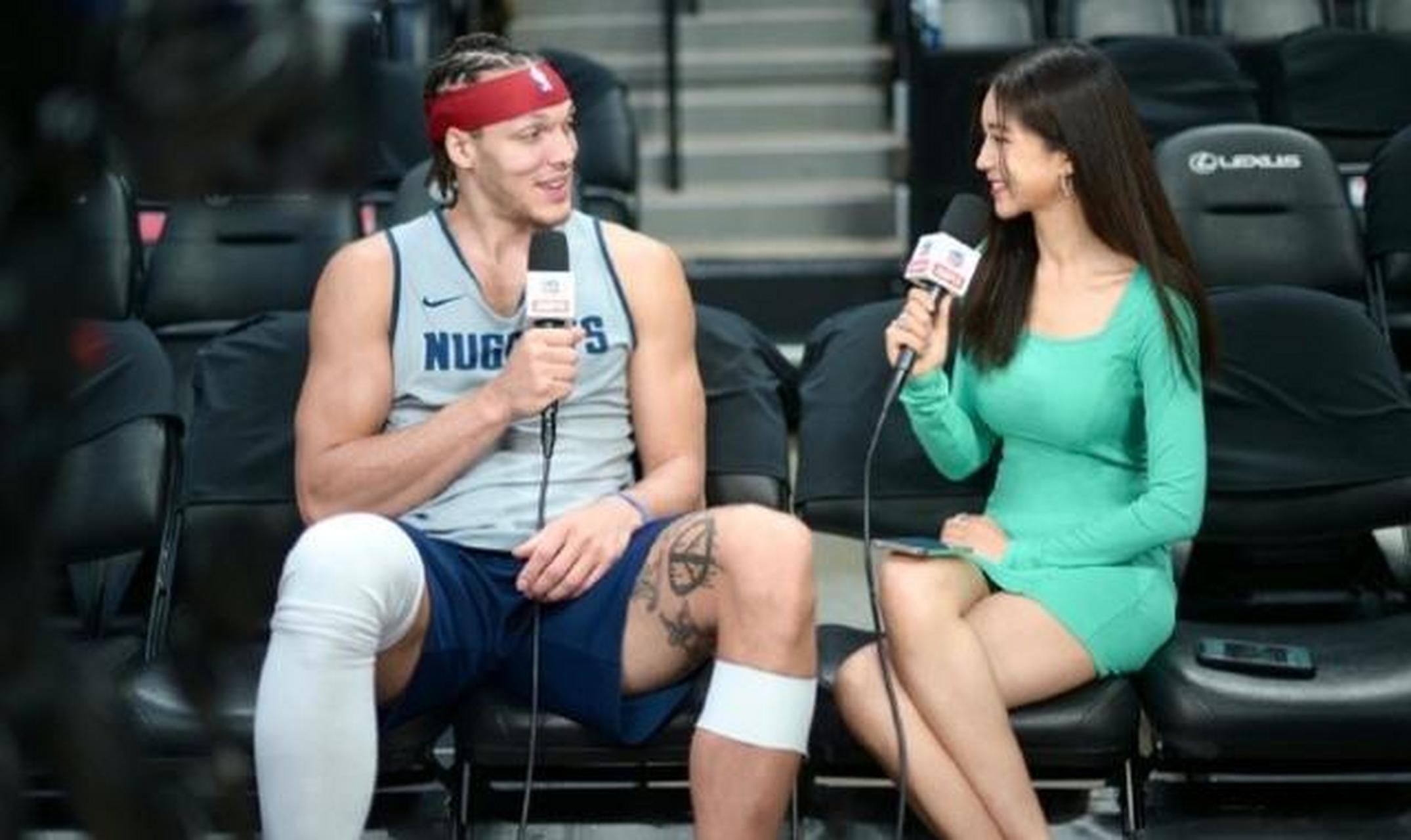 中国女记者采访nba总决赛球员,身材傲人,这球员的表情也抢镜,乐开花了