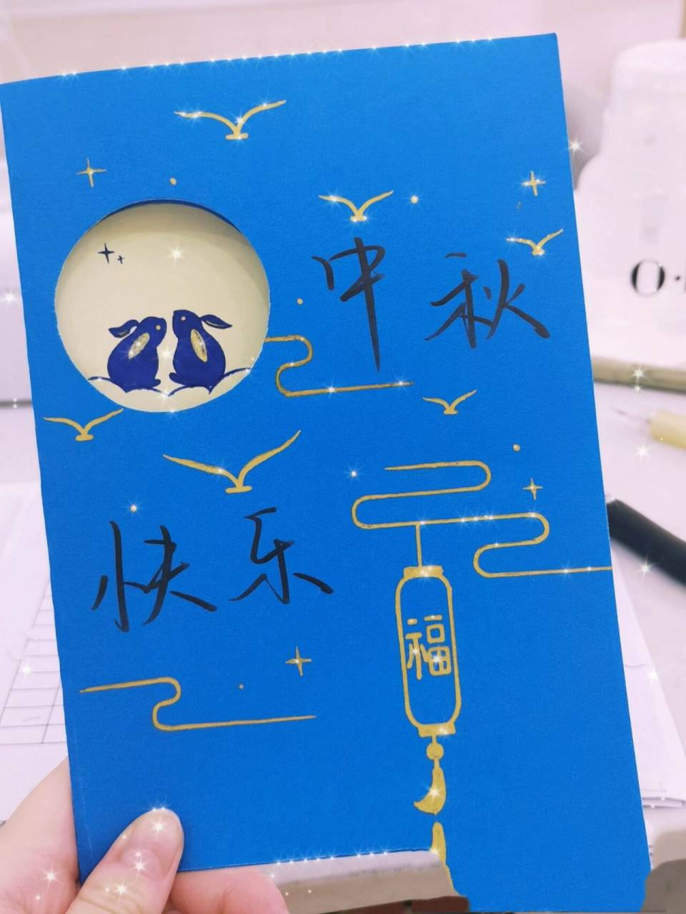 diy中秋节贺卡(含步骤) 用到的工具: a4蓝色卡纸 三菱高光笔金色 樱花