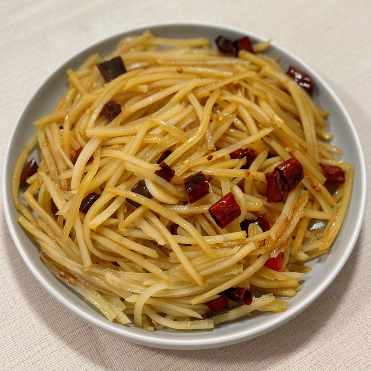 9297食谱分享|炝炒土豆丝 步骤: 16615土豆去皮切丝后泡水