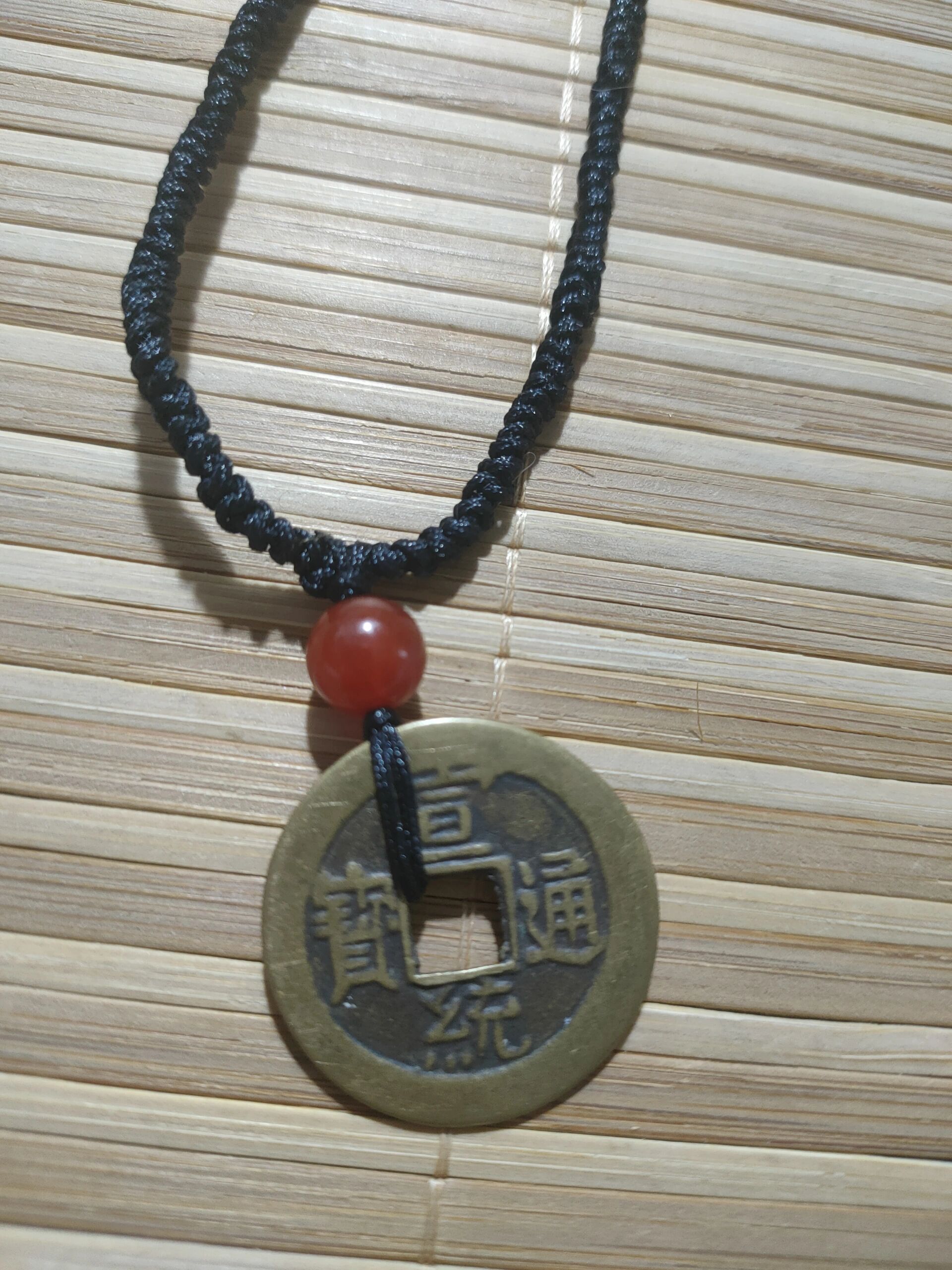 自己编绳的铜钱项链  黑绳金刚结,编了我两个半小时