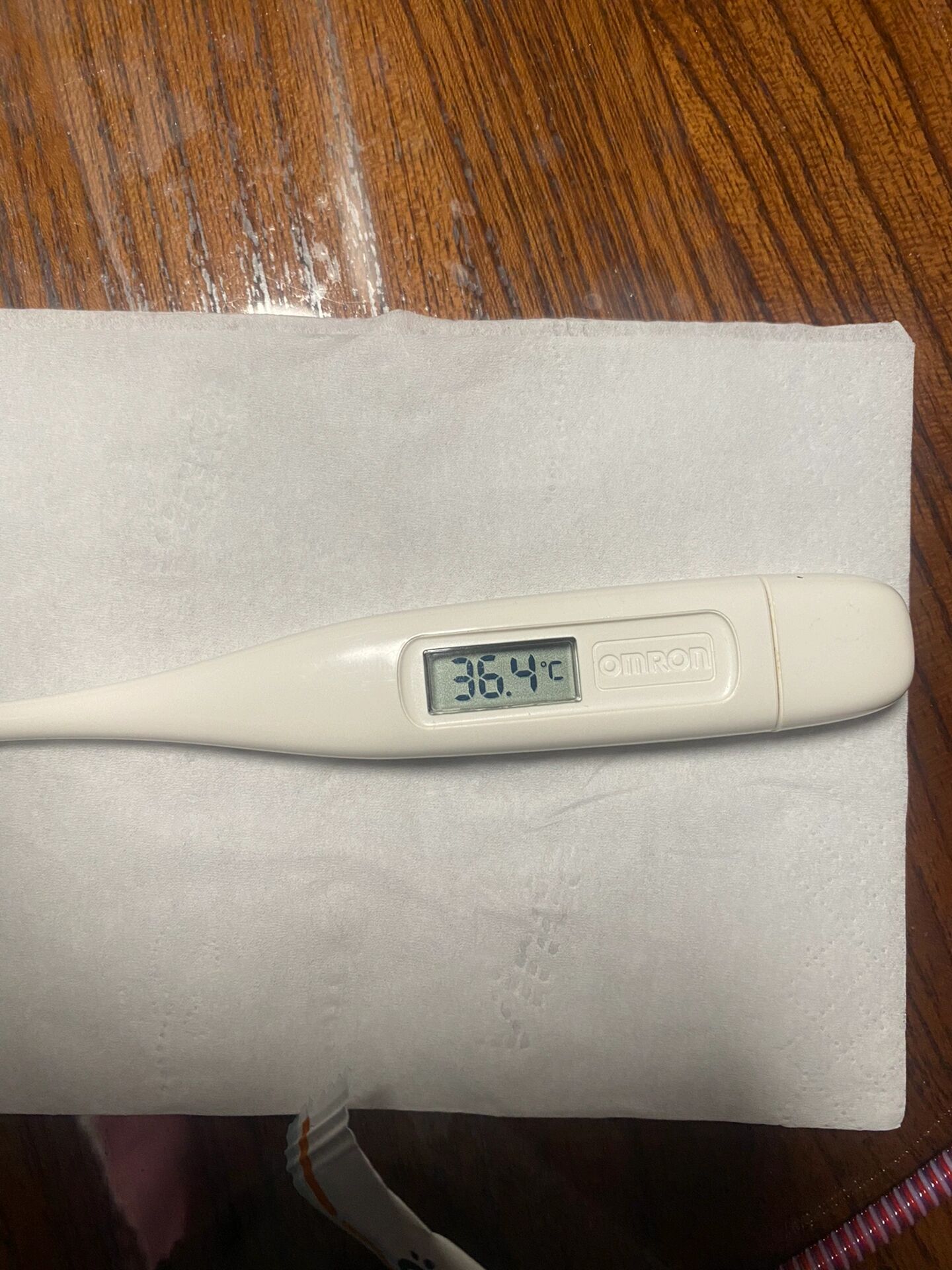 这个温度要比我平时的正常体温高,我到底是不是发烧,又用水银温度计测