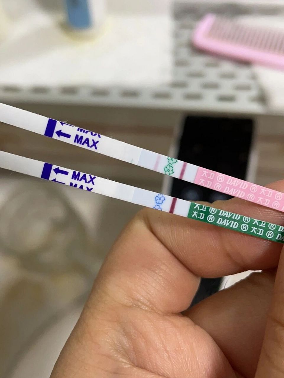 毓婷验孕棒是不是自带水印! 毓婷带粉印了,但是大卫依旧高冷白的发光!