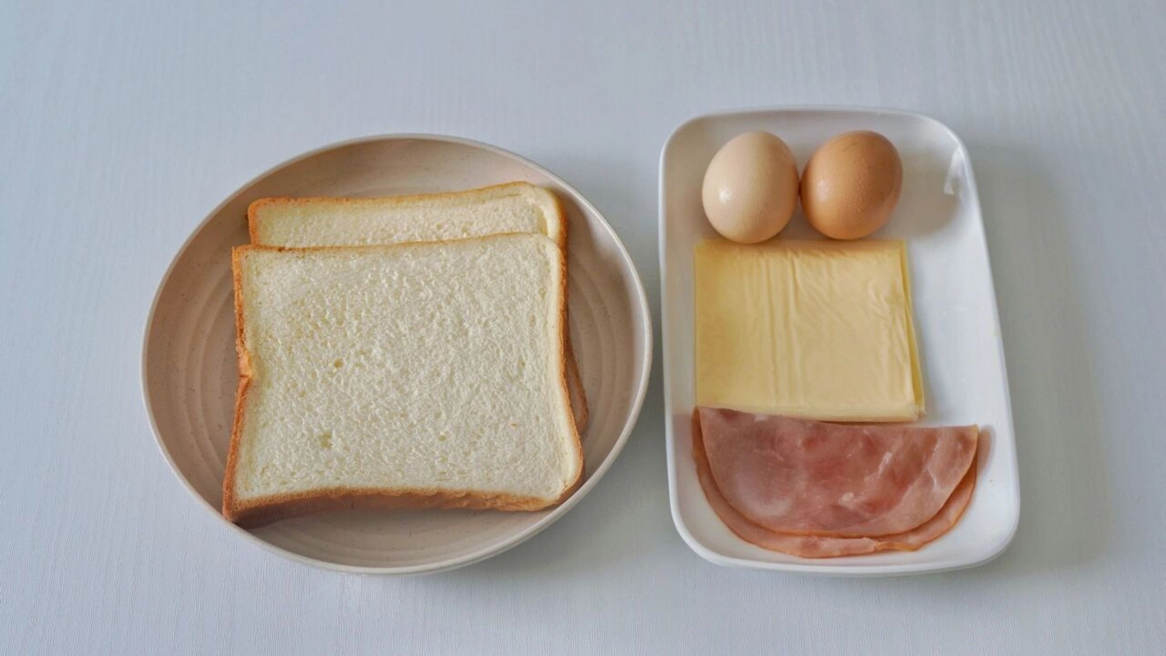 平底锅5分钟97芝士火腿吐司,懒人营养早餐 最近因为工作忙,总是忘记