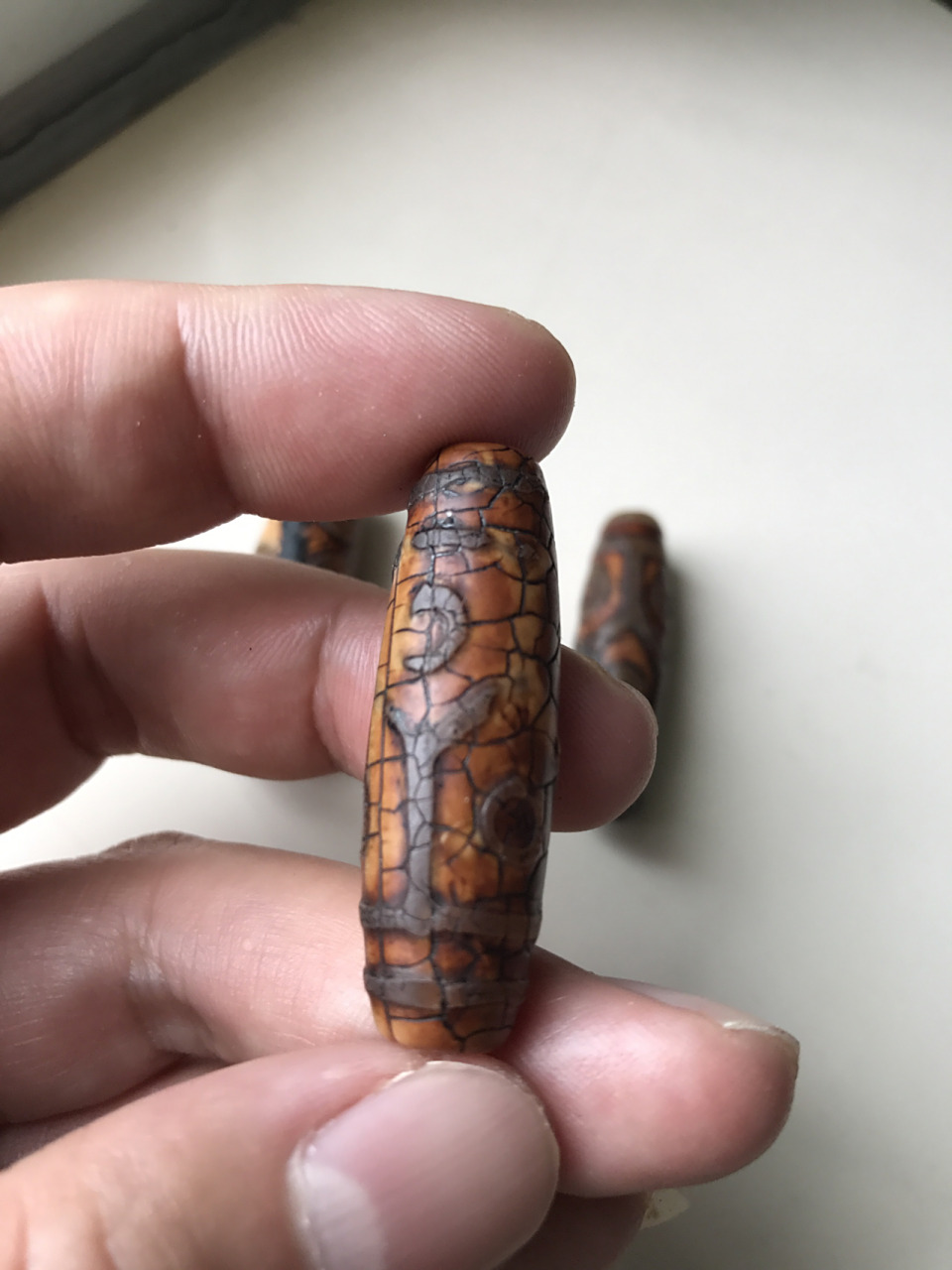 最早的天珠是由海螺化石打磨而成的法螺天珠94后来由于稀缺9015