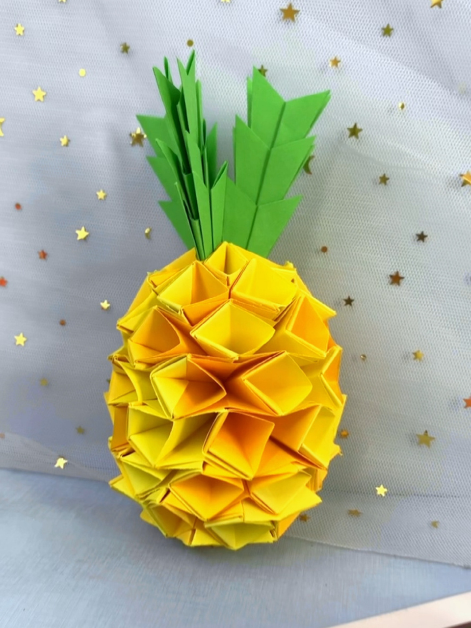三角折纸菠萝的插法图片