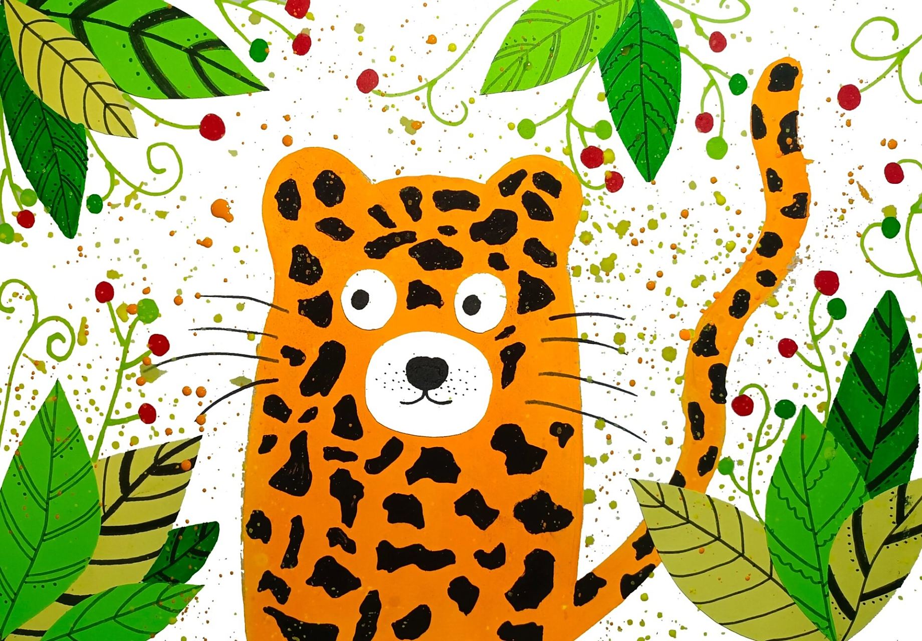 步骤二:用白纸画出花豹眼睛,鼻子,嘴巴并剪下来贴上去.