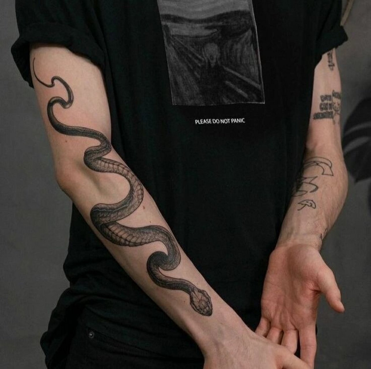 小臂蛇缠臂纹身图案 武汉大咖纹身