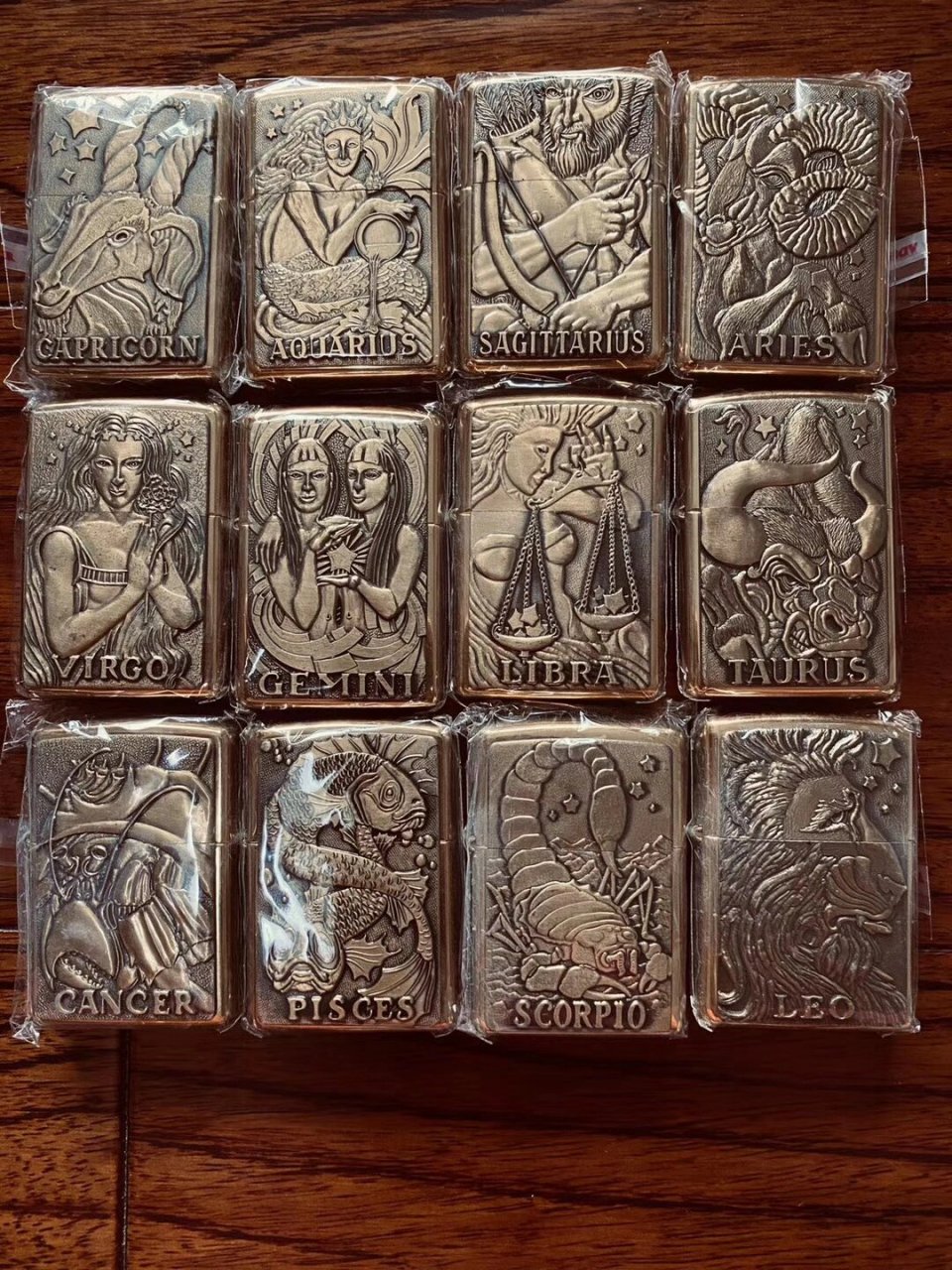 zippo打火机纯铜巴雷特十二星座 目前一套市场价格5w  镀铬的也在1.