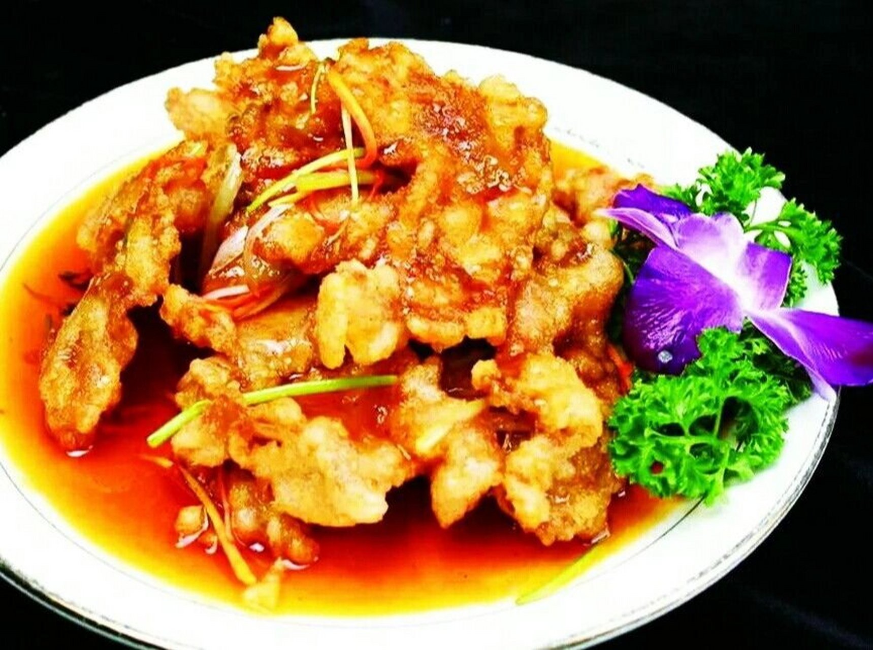 东北名菜锅包肉起源于哈尔滨 锅包肉是中国东北菜中非常著名的一道菜.