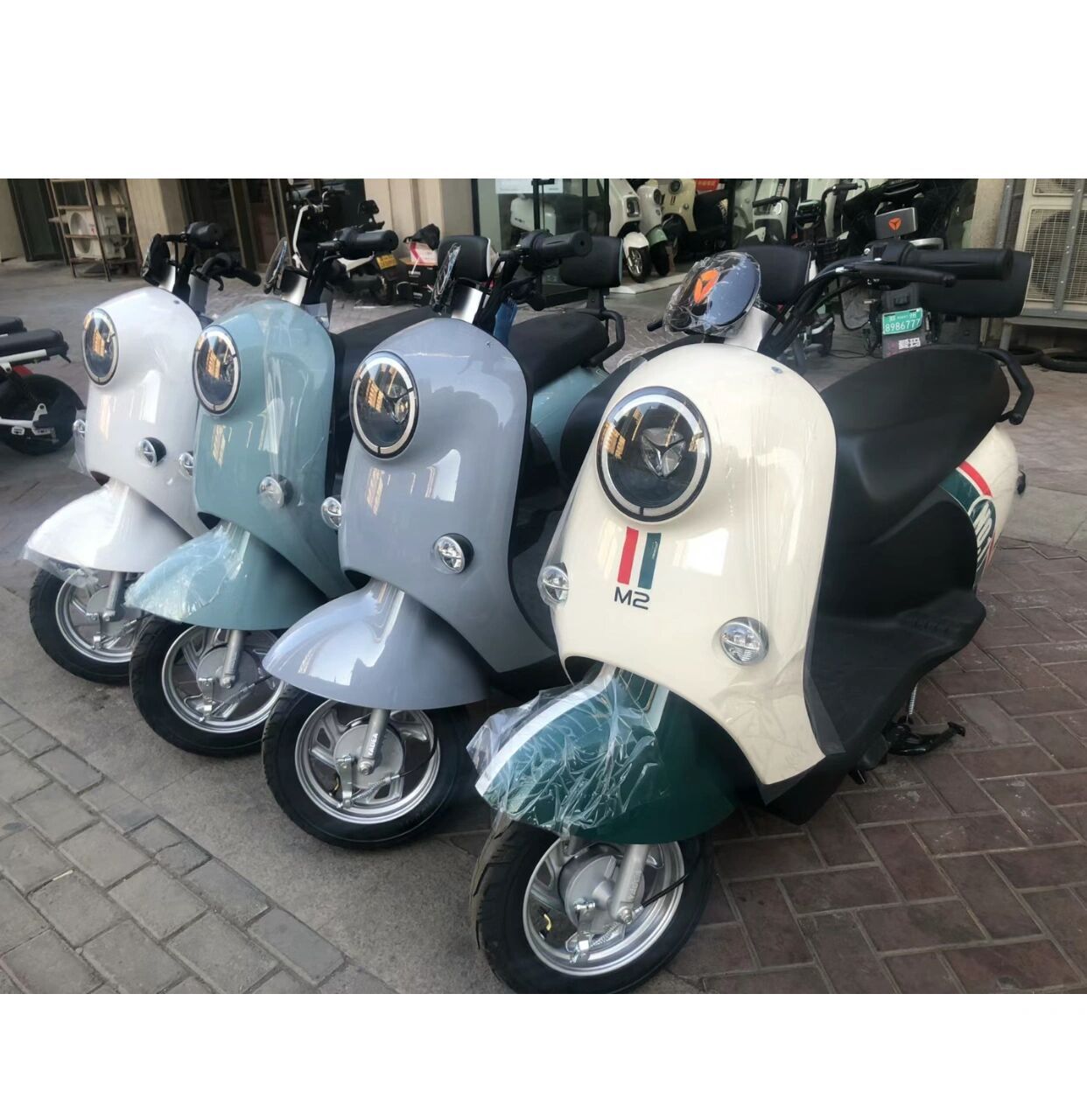 雅迪m2电动车 刚去雅迪店里转了一圈,目前m2活动价1999元,换购价是