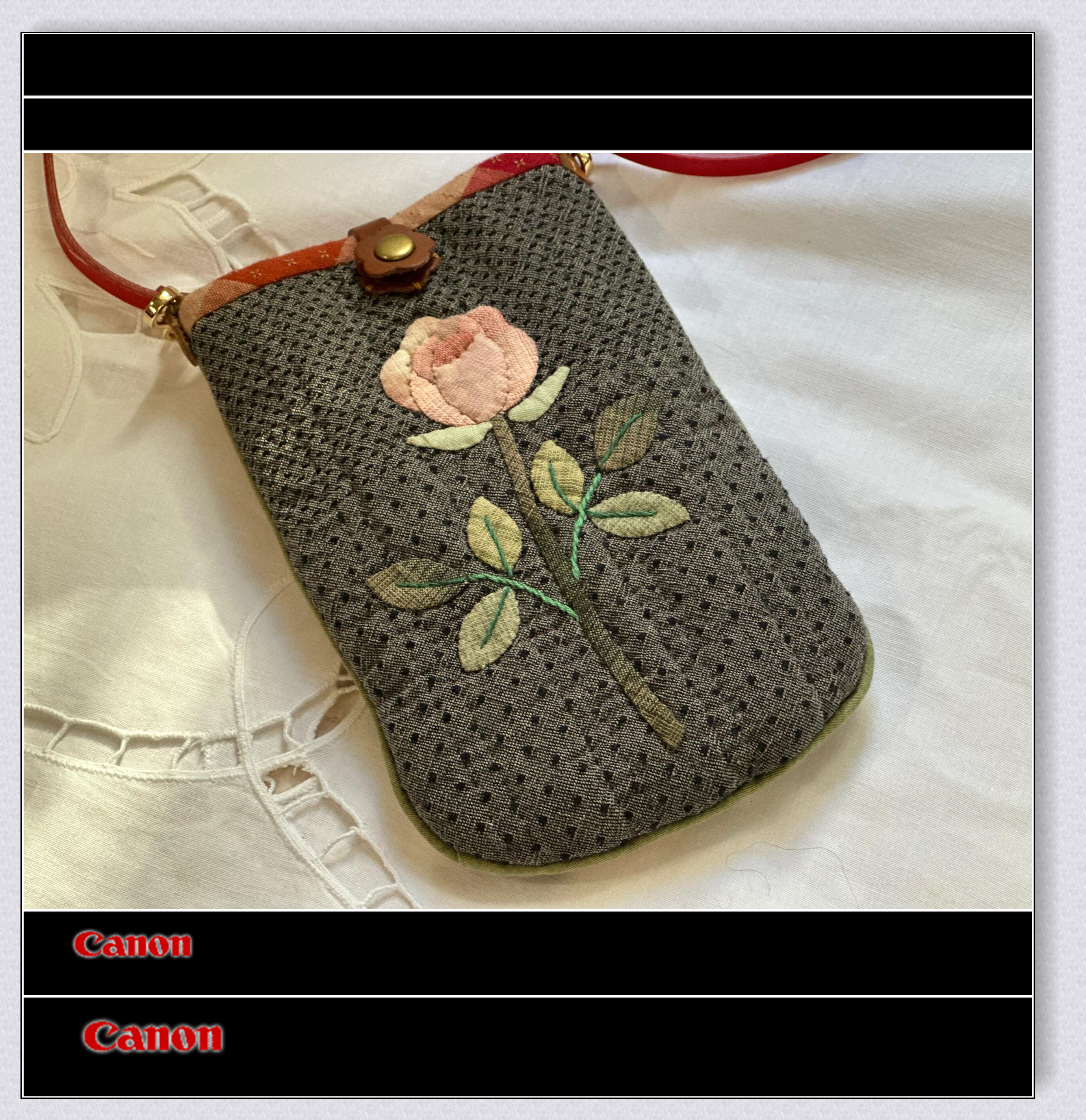 妈妈一定很开心  做这款手机包需要准备: 1. 表布,里布,铺棉 2.