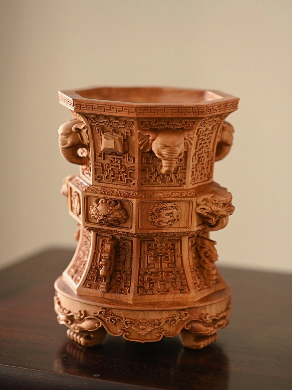 老山檀"青铜象首兽面纹"笔筒 器型端方庄重,材质坚密细腻,雕饰青铜