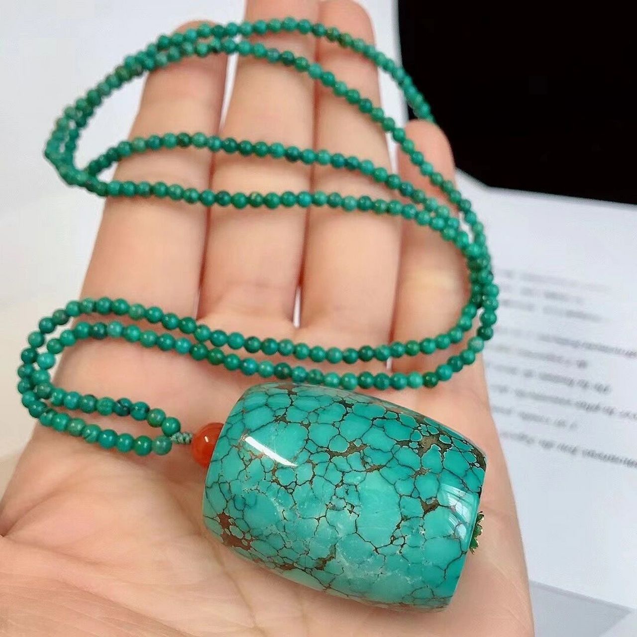 什么是注胶绿松石?