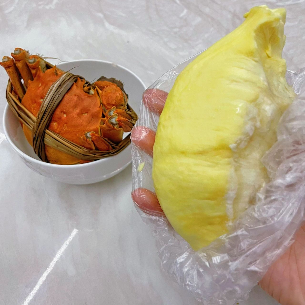 问:螃蟹和榴莲可以一起吃嘛