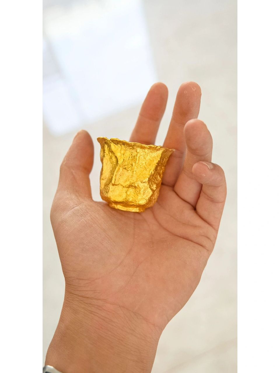 黄金杯100克 看来大家都不太喜欢标准物件 有人说它像易拉罐 也有人说