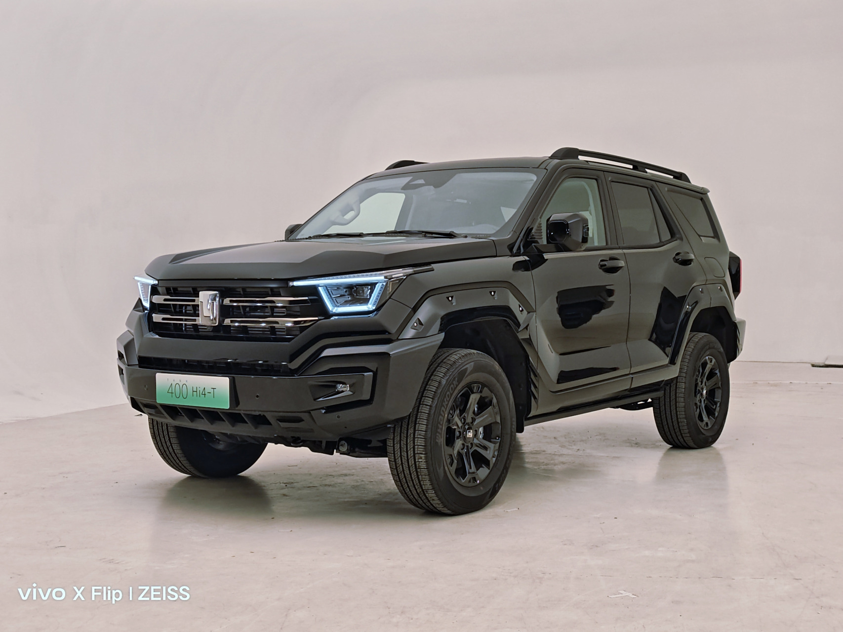 坦克400可以选装固铂at3越野轮胎,图1是选装at3的效果,图2是普通公路