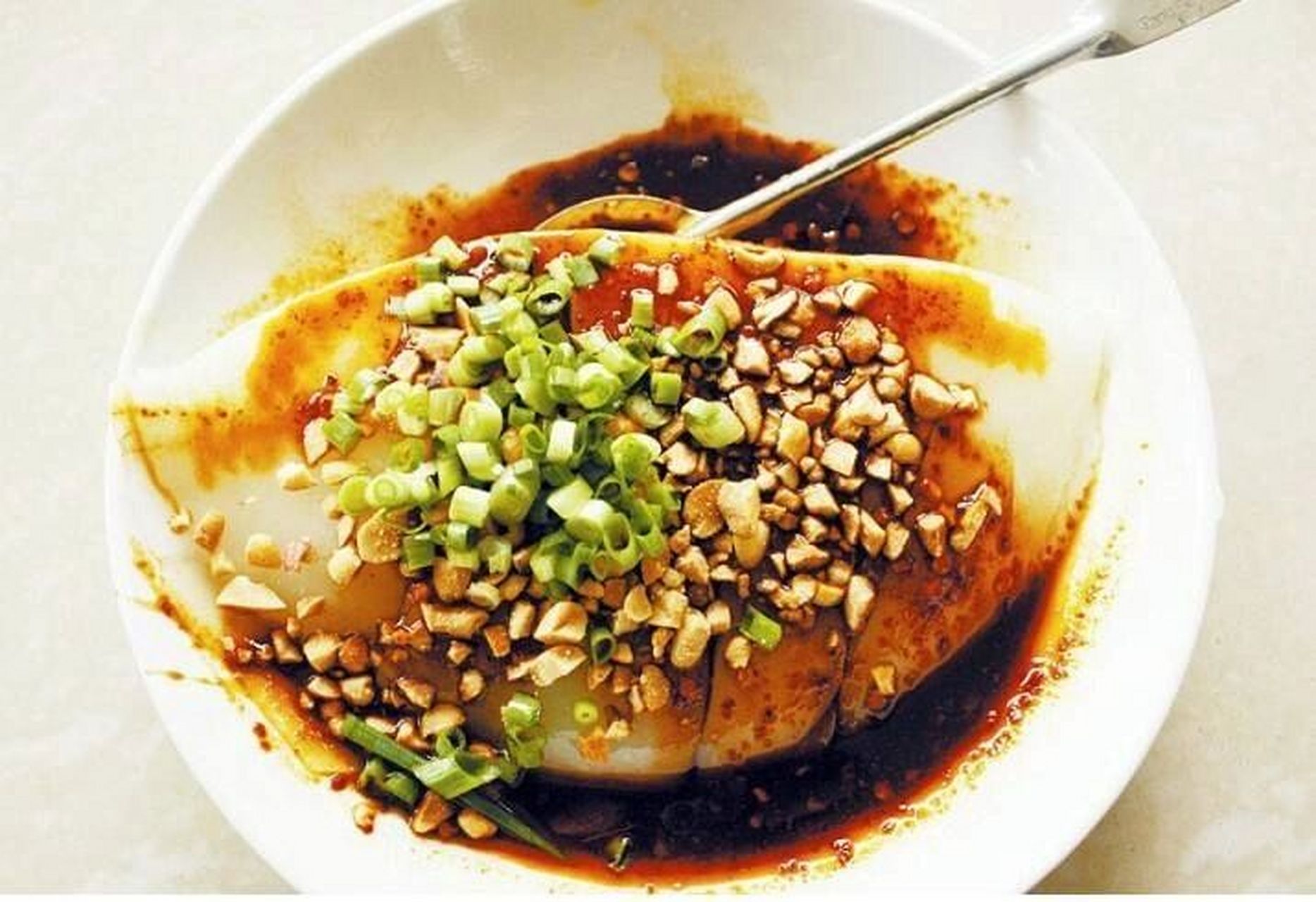 宜宾特色小吃之双河凉糕 葡萄井水很特别,双河人就用葡萄井的泉水泡米