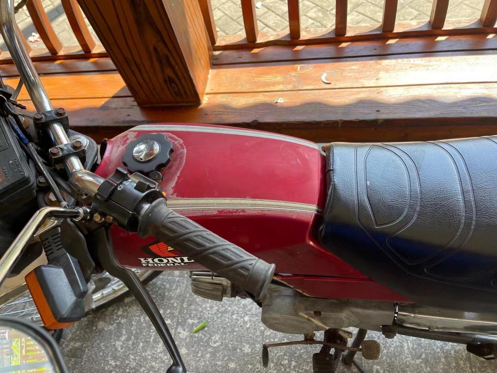 本田鹰仔100 1999米.