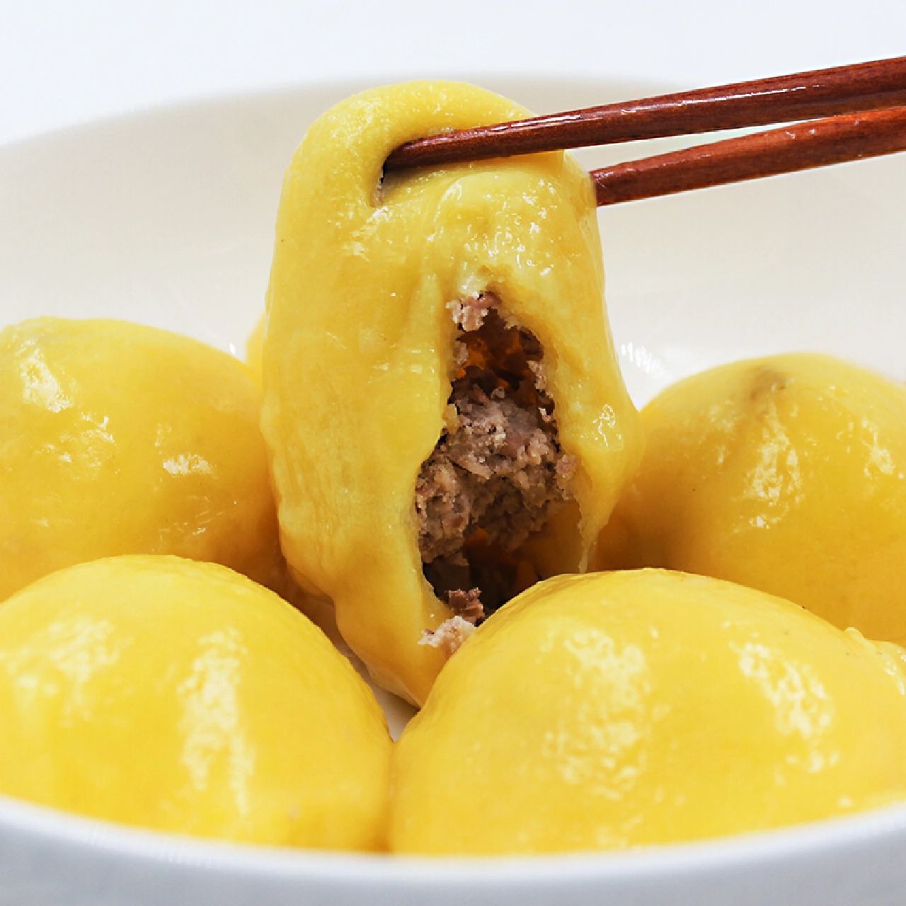 来看看正宗东北大黄米粘豆包怎样做 粘豆包是东北人非常喜欢吃的一种