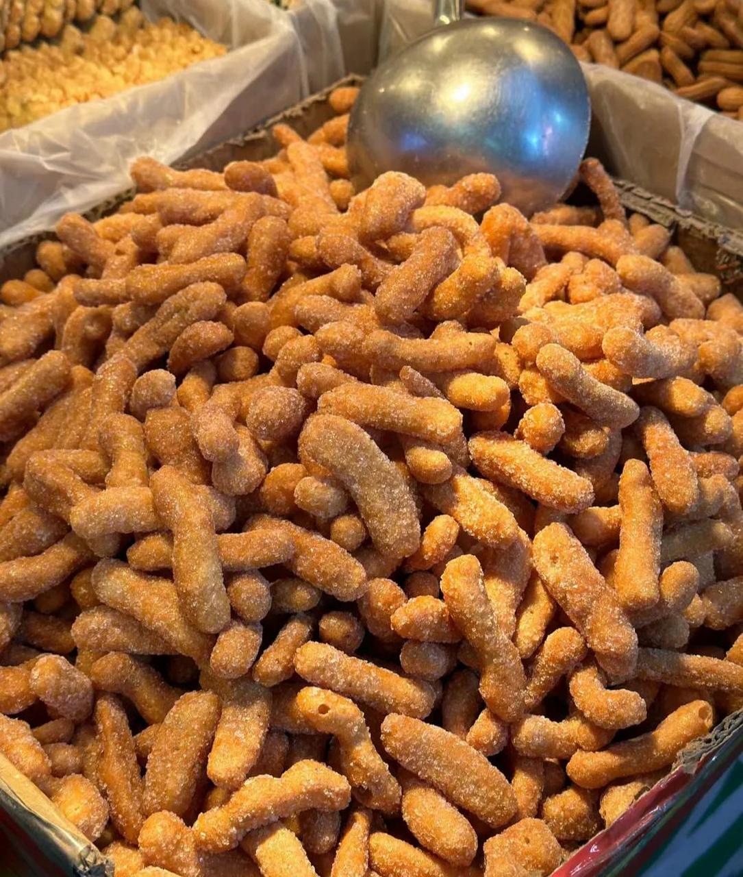 我们这里叫江米条,也有地方叫果子,糖果子,油枣,兰花根,京枣儿,还有按