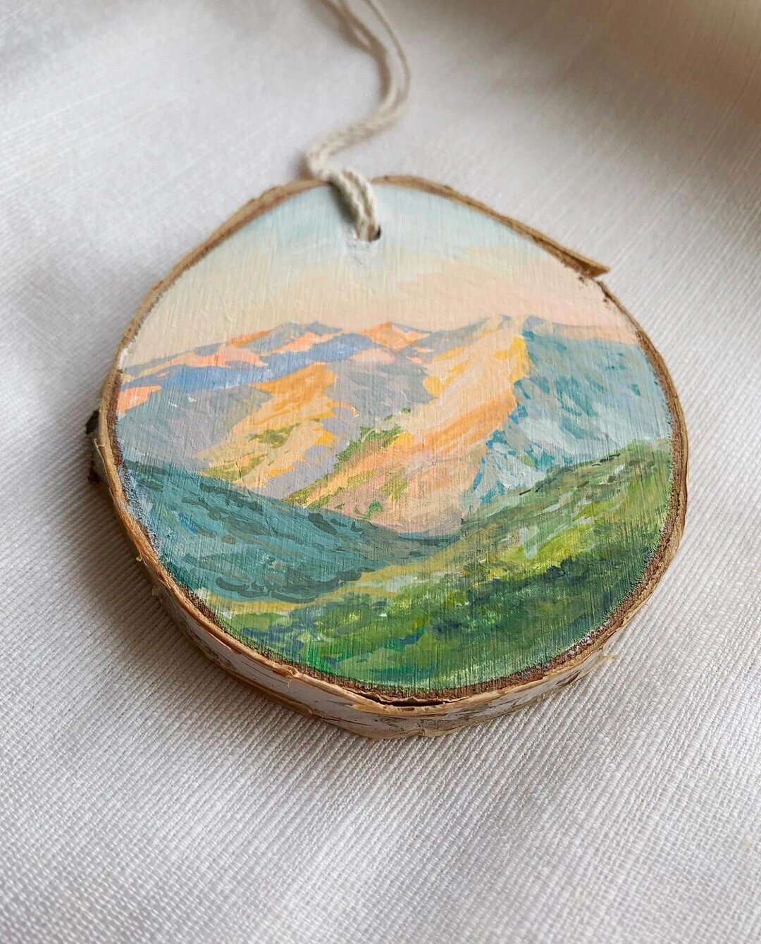 丙烯圆木片风景画