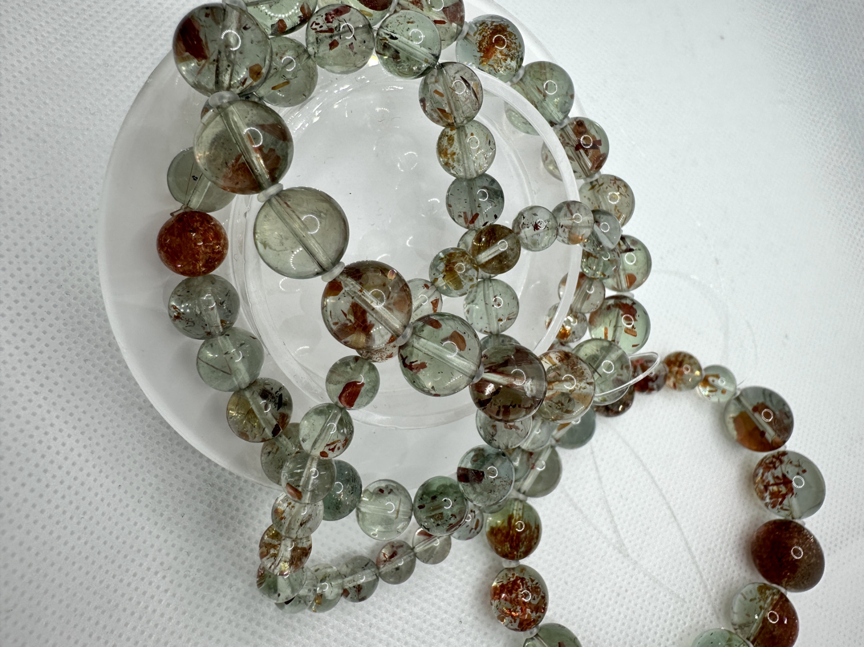 "阿鲁沙水晶"?到底是什么东西:9599 先说,图上这种和水晶不沾边.