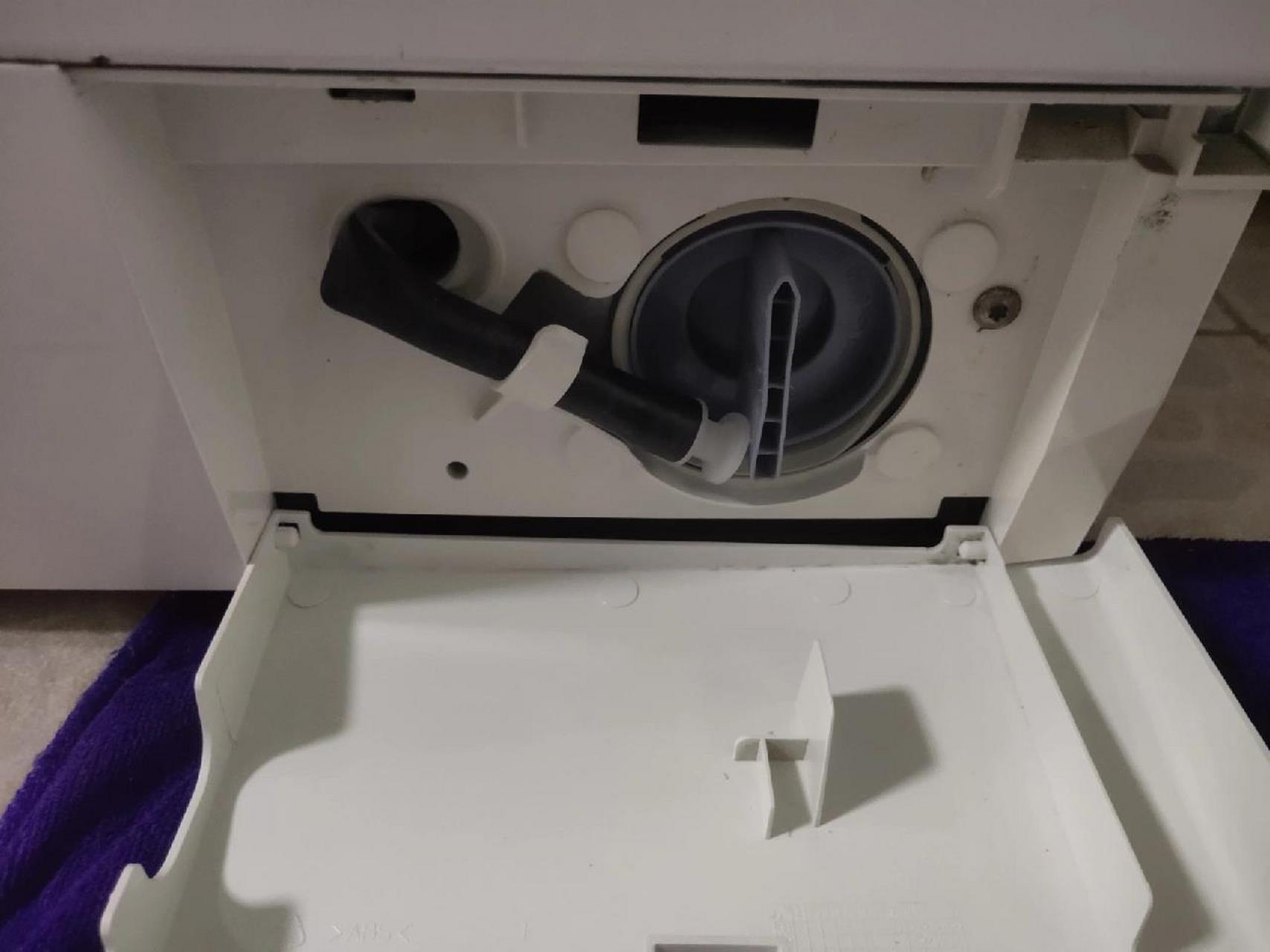 西门子洗衣机故障代码e18,出水口堵塞 今天洗衣机罢工,出现e18故障