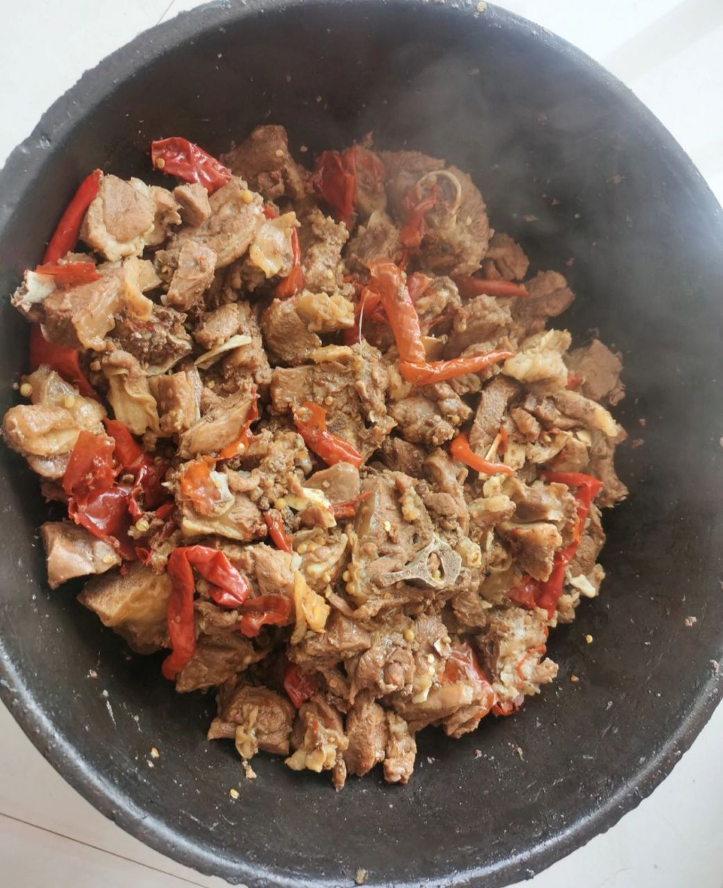 陕北铁锅炖羊肉(附教程)  步骤1 烹饪模式 葱,姜切段,加花椒,辣椒一起