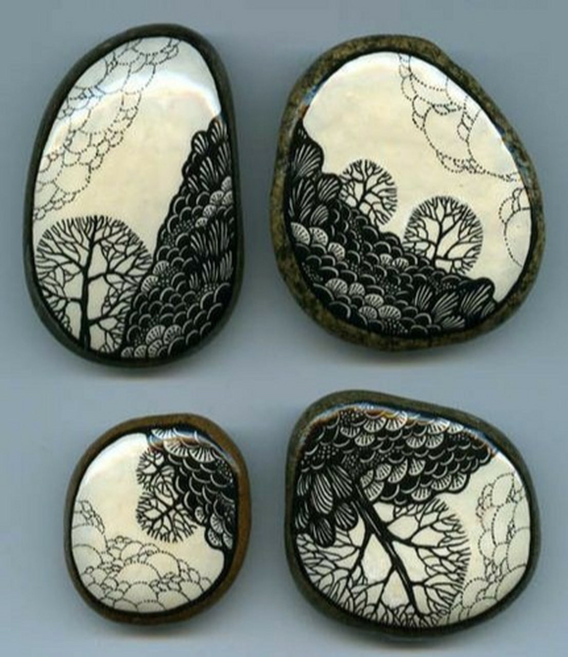 黑白手绘石头画 白色的底,黑色的线,很漂亮的形式感 #手绘石头画