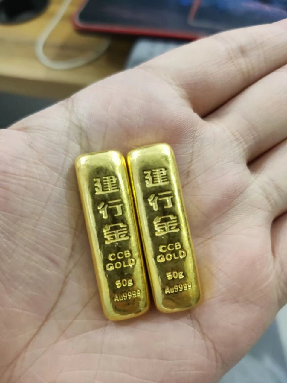 建行金条,两根一共100克,434一克,没有工费.