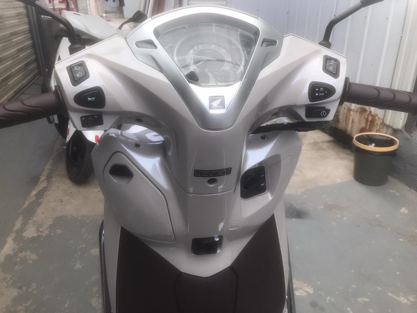 (24款)五羊本田新一代立德125c奶伽白色,智能锁,脉冲启动,三秒启停,边