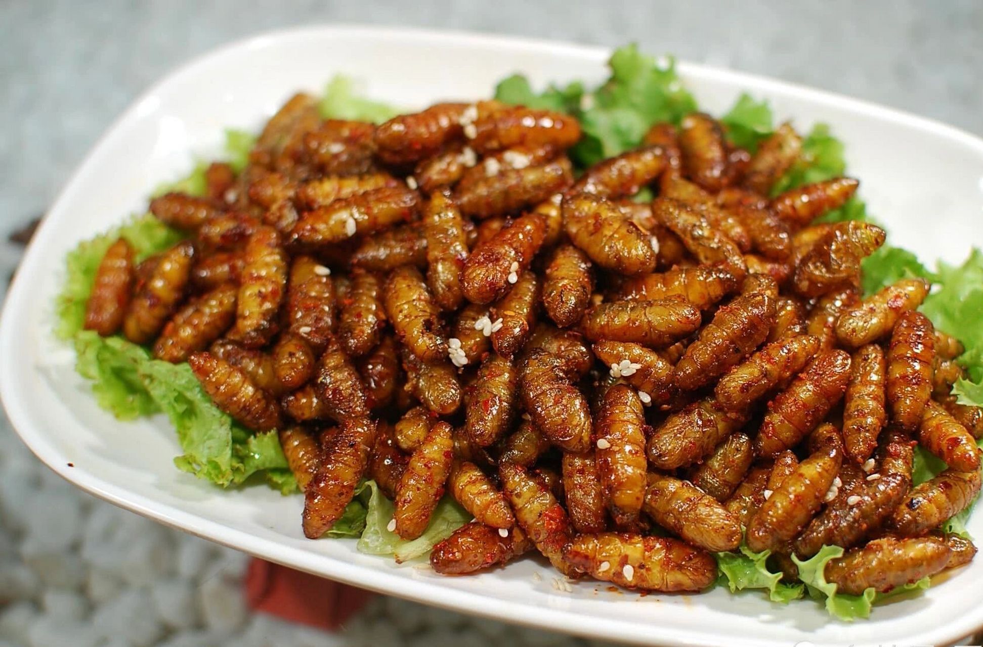 香辣蚕蛹 最为一个南方人,强烈推荐香辣蚕蛹这道菜04 做法如下:买