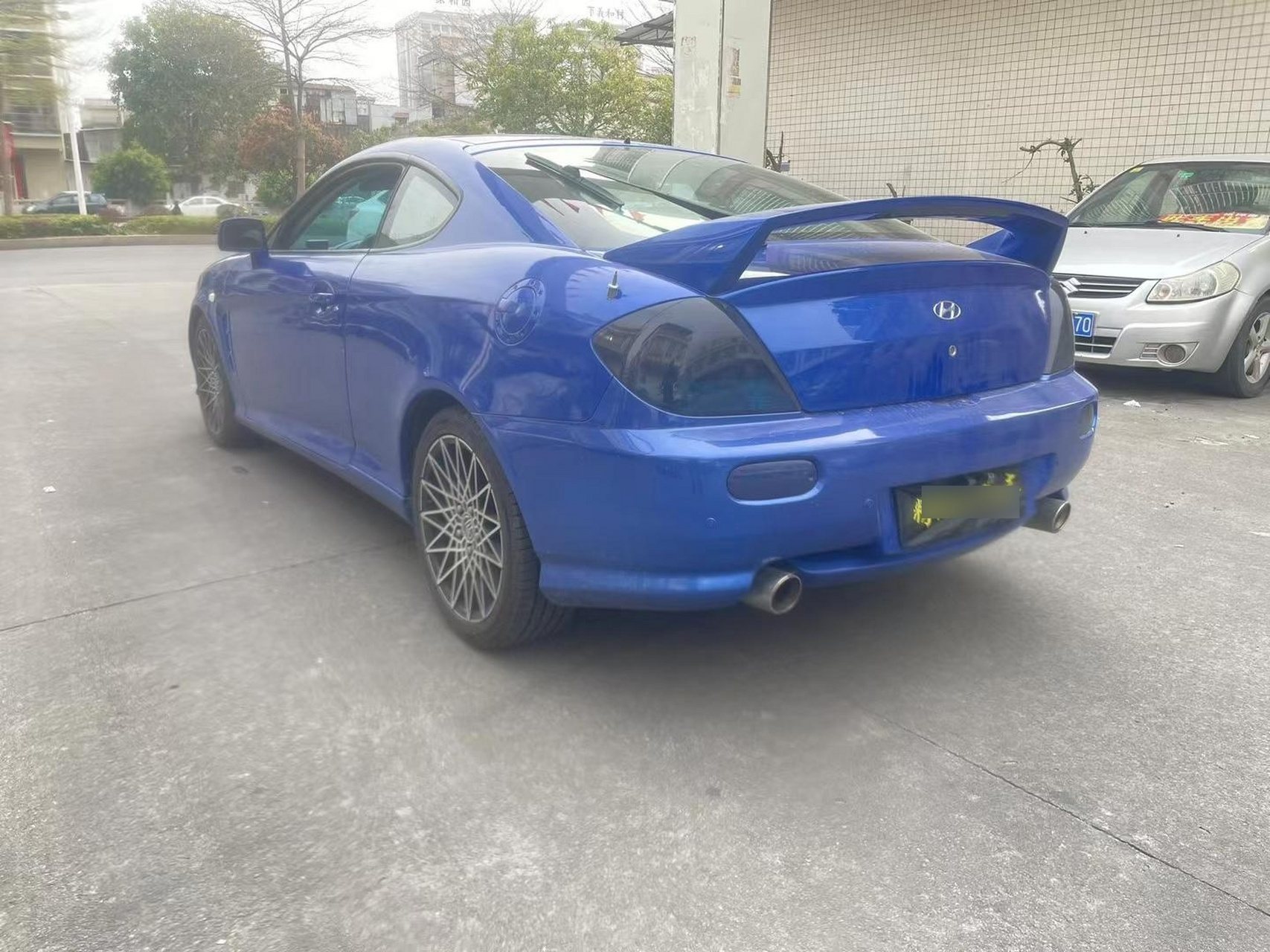 06年现代酷派v6发动机轿跑,车况漂亮,无事故,备胎末落地,年审明年4