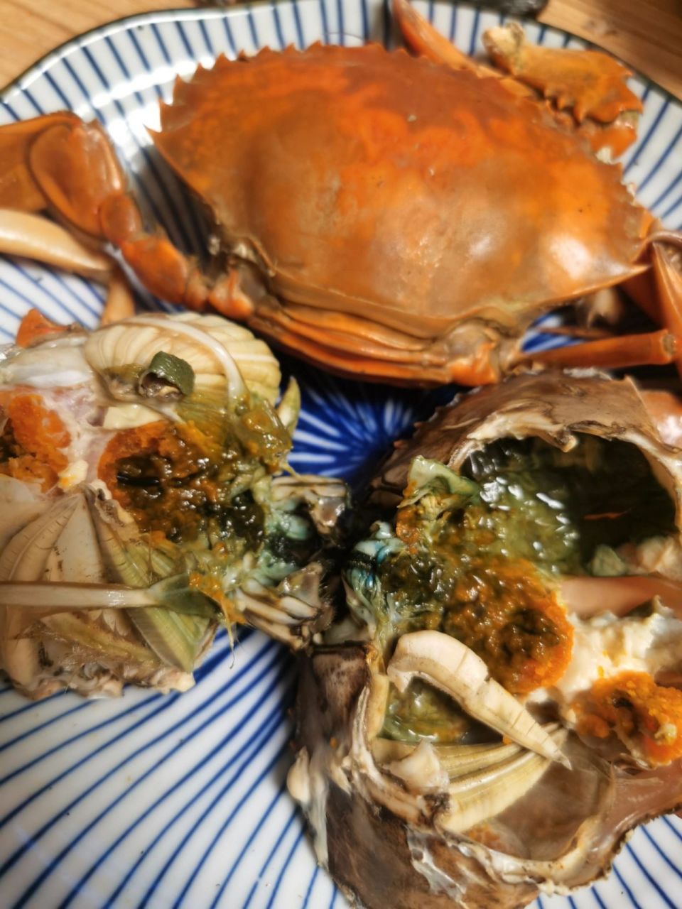 漳州红膏蟹蒸好绿色的稀拉拉是个啥 不懂就问 绿色这个是啥,能吃吗 下