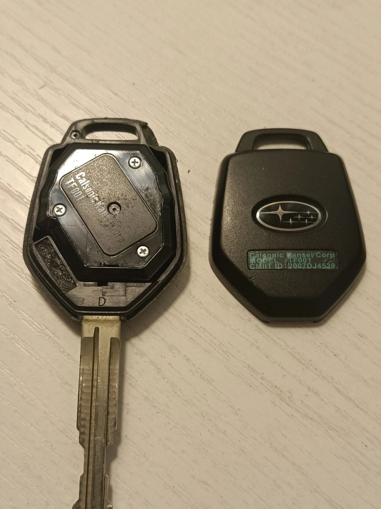 2013款斯巴鲁森林人钥匙电池更换 又一篇换电池的 开了了8年半的